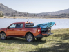 2022-ford-maverick-lariat-2l-ecoboost-awd-fx4-off-road-package-exterior-027-side-rear-three-quarters-kayak-in-bed