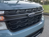 2022-ford-maverick-xl-fa-garage-clubhouse-area-51-exterior-017-grille-ford-logo