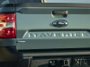 2022-ford-maverick-xlt-hybrid-exterior-016-rear-three-quarters-tailgate-with-ford-logo-and-debossed-maverick-script