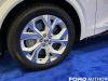 2022-ford-mustang-mach-e-ice-white-appearance-package-2022-nyias-live-photos-exterior-010-front-wheel-and-tire