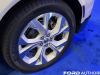 2022-ford-mustang-mach-e-ice-white-appearance-package-2022-nyias-live-photos-exterior-012-rear-wheel-and-tire