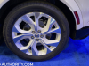 2022-ford-mustang-mach-e-ice-white-appearance-package-2022-nyias-live-photos-exterior-013-rear-wheel-and-tire
