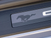 2022-ford-mustang-convertible-coastal-limited-edition-interior-005-lighted-sill-plate-with-running-mustang-logo
