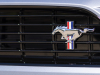 2022-ford-mustang-convertible-coastal-limited-edition-top-down-exterior-016-grille-mustang-logo