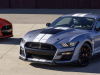 2022-ford-mustang-gt500-heritage-edition-in-brittany-blue-with-part-of-2022-ford-mustang-shelby-gt500-carbon-fiber-track-pack-in-code-orange-exterior-001-front-three-quarters