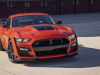 2022-ford-mustang-shelby-gt500-carbon-fiber-track-pack-code-orange-exterior-025-high-front-three-quarters-grille-shelby-snake-logo