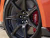 2022-ford-mustang-shelby-gt500-carbon-fiber-track-pack-code-orange-exterior-037-front-exposed-carbon-fiber-wheel-ford-logo-on-center-cap-red-brembo-brake-caliper