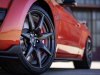 2022-ford-mustang-shelby-gt500-carbon-fiber-track-pack-code-orange-exterior-038-front-carbon-fiber-wheel-ford-logo-on-center-cap-red-brembo-brake-caliper