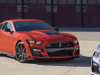 2022-ford-mustang-shelby-gt500-carbon-fiber-track-pack-in-code-orange-with-part-of-2022-ford-mustang-gt500-heritage-edition-exterior-002-front-three-quarters