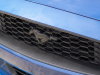 2022-ford-mustang-stealth-edition-exterior-011-grille-black-mustang-pony-logo-badge