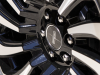 2022-lincoln-navigator-black-label-chroma-caviar-exterior-018-wheel-detail-lincoln-logo-on-wheel-center-cap