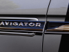 2022-lincoln-navigator-black-label-chroma-caviar-exterior-020-navigator-logo-script-on-front-fender-insert