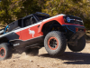 2023-ford-bronco-dr-press-pictures-exterior-002-front-three-quarters-jumping