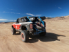 2023-ford-bronco-dr-press-pictures-exterior-004-rear-three-quarters-desert-running