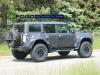 2023-ford-bronco-raptor-prototype-spy-shots-exterior-may-2021-011-side-rear-three-quarters