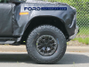 2023-ford-bronco-raptor-prototype-spy-shots-exterior-may-2021-019-front-tire-bf-goodrich-all-terrain-ta