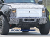 2023-ford-bronco-raptor-prototype-spy-shots-exterior-may-2021-020-front-end-grille-amber-headlights