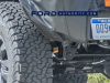 2023-ford-bronco-raptor-spy-shots-september-2020-017-rear-suspension-shocks-tires
