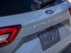 2023-ford-escape-phev-plug-in-hybrid-vapor-blue-press-photos-exterior-011-rear-ford-logo-badge-escape-script