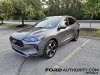 2023-ford-escape-st-line-elite-awd-hev-carbonized-gray-metallic-m7-fa-garage-review-exterior-009-side-front-three-quarters