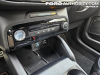 2023-ford-escape-st-line-elite-awd-hev-fa-garage-review-interior-040-center-stack-controls-engine-start-stop-button-volume-knob-wireless-charger