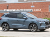 2023-ford-escape-st-line-prototype-spy-shots-july-2022-exterior-003-side-front-three-quarters