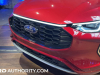2023-ford-escape-st-line-rapid-red-live-photos-exterior-006-front-fascia-grille-ford-logo-badge
