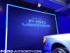 2022-ford-f-150-lightning-platinum-2021-sema-live-photos-exterior-008-box-f-150-lightning-signage