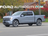 2022-ford-f-150-lightning-platinum-iced-blue-silver-real-world-pictures-exterior-003