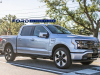 2022-ford-f-150-lightning-platinum-iconic-silver-first-on-the-road-photos-october-2021-exterior-004-front-three-quarters