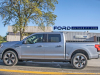 2022-ford-f-150-lightning-platinum-iconic-silver-first-on-the-road-photos-october-2021-exterior-006-side