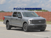 2022-ford-f-150-lightning-pro-iconic-silver-real-world-pictures-exterior-001
