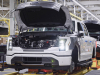 2022-ford-f-150-lightning-start-of-production-rouge-electric-vehicle-center-april-26-2022-023-truck-on-line-no-wheels-or-tires