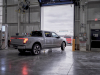 2022-ford-f-150-lightning-start-of-production-rouge-electric-vehicle-center-april-26-2022-026-driving-out-after-charging