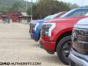 2022-ford-f150-lightning-first-drive-lineup-exterior-015-platinum-iconic-silver-metallic-xlt-rapid-red-metallic-tinted-clearcoat-lariat-antimatter-blue-metallic