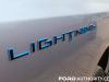 2022-ford-f150-lightning-platinum-first-drive-exterior-012-lightning-logo-badge