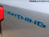 2022-ford-f150-lightning-platinum-first-drive-exterior-015-lightning-logo-badge