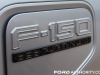 2022-ford-f150-lightning-platinum-first-drive-exterior-020-charge-port-cover-f150-logo-badge