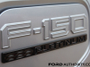 2022-ford-f150-lightning-platinum-first-drive-exterior-021-charge-port-cover-f150-logo-badge