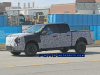 2023-ford-f-150-electric-prototype-spy-shots-more-rugged-march-2021-005
