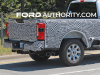 2023-ford-f-250-super-duty-xlt-prototype-spy-shots-july-2022-exterior-017-side-rear-three-quarters-integrated-side-bed-step