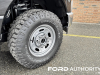 2023-ford-f-350-super-duty-xl-crew-cab-8-foot-bed-srw-xl-off-road-package-17z-chrome-package-96v-agate-black-um-first-drive-exterior-020-goodyear-wrangler-duratrac-tire-hub-cover