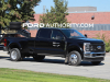 2023-ford-f-450-super-duty-lariat-agate-black-um-towing-trailer-first-photos-october-2022-exterior-002