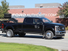 2023-ford-f-450-super-duty-lariat-agate-black-um-towing-trailer-first-photos-october-2022-exterior-003