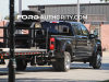 2023-ford-f-450-super-duty-lariat-agate-black-um-towing-trailer-first-photos-october-2022-exterior-006