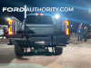 2023-ford-f-series-super-duty-f-250-lariat-azure-gray-reveal-event-october-2022-exterior-009-rear-tail-lights-on-integrated-tail-gate-step-ladder-extending-grab-handle