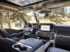 2023-ford-super-duty-f-350-limited-press-photos-interior-004-cockpit-dash-center-stack-center-console-rear-passenger-cup-holders