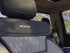 2023-ford-super-duty-f-350-limited-press-photos-interior-007-passenger-seat-stitching-detail-limited-script-bang-and-olufsen-speaker-headrest