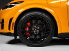 2023-mustang-mach-e-gt-performance-edition-cyber-orange-nite-pony-package-exterior-006-side-headlight-splitter-charge-port-door-high-gloss-black-19-inch-front-wheel-brembo-brakes
