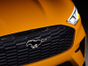 2023-mustang-mach-e-gt-performance-edition-cyber-orange-nite-pony-package-exterior-010-front-front-camera-grille-mustang-pony-backlit-logo-badge
